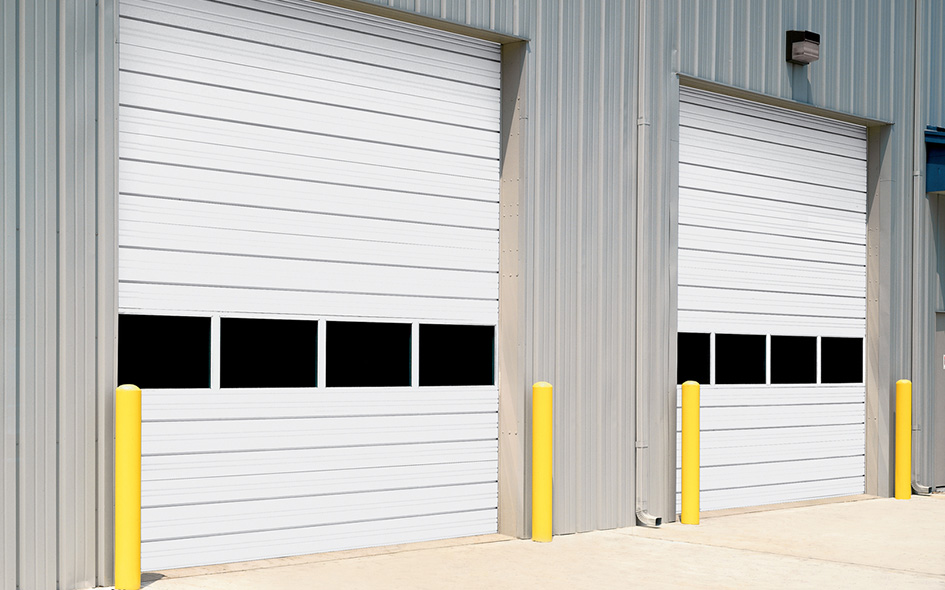Sectional doors on a commercial warehouse building